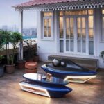 modern terrace of a building with furniture and plants